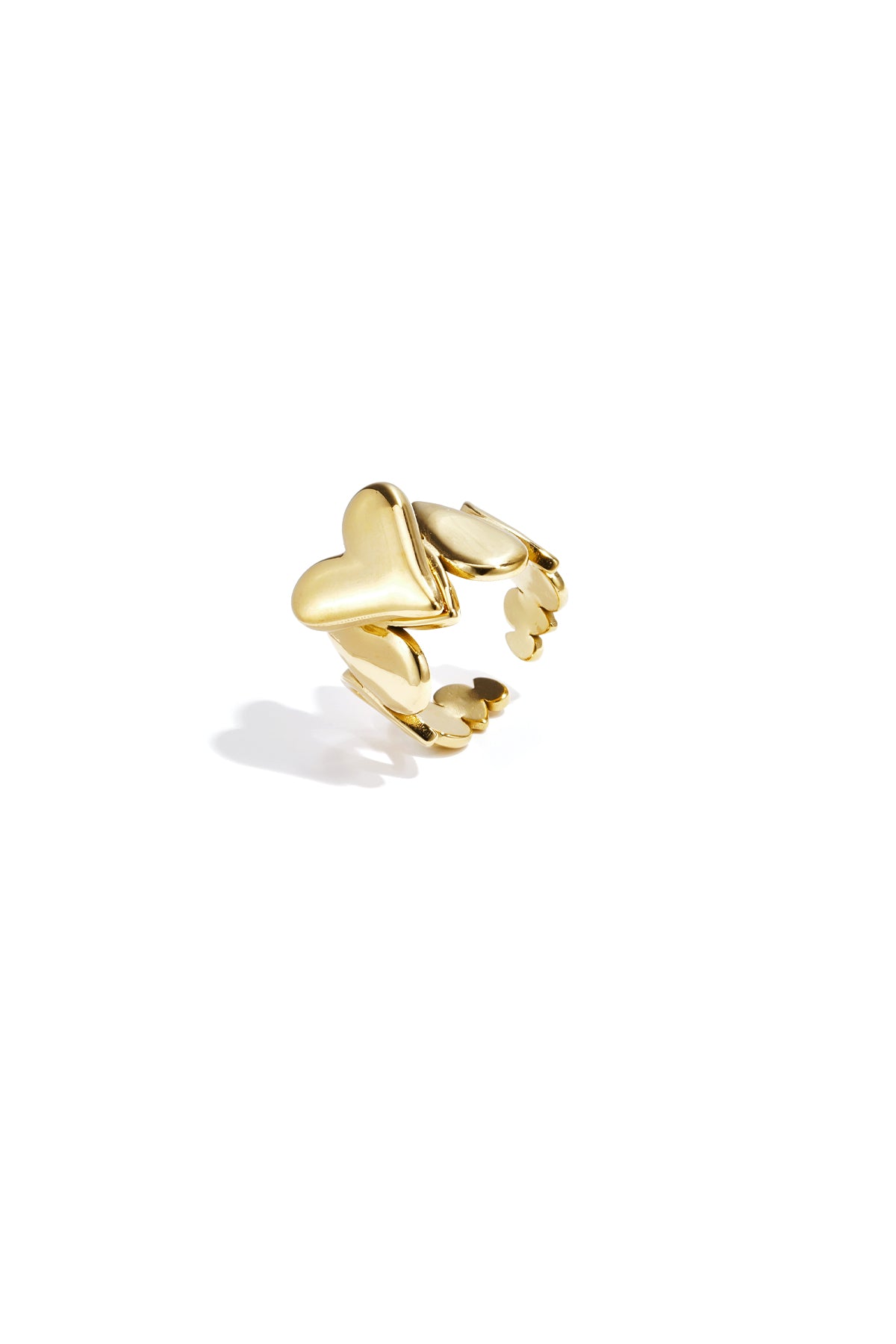 Bague imposante ornée de pendentifs et d'un cœur