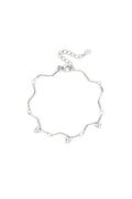 Bracelet orné de pierres et d'un motif en zigzag