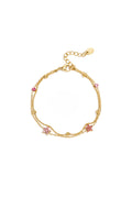 Bracelet orné de pierres colorées et de fleurs