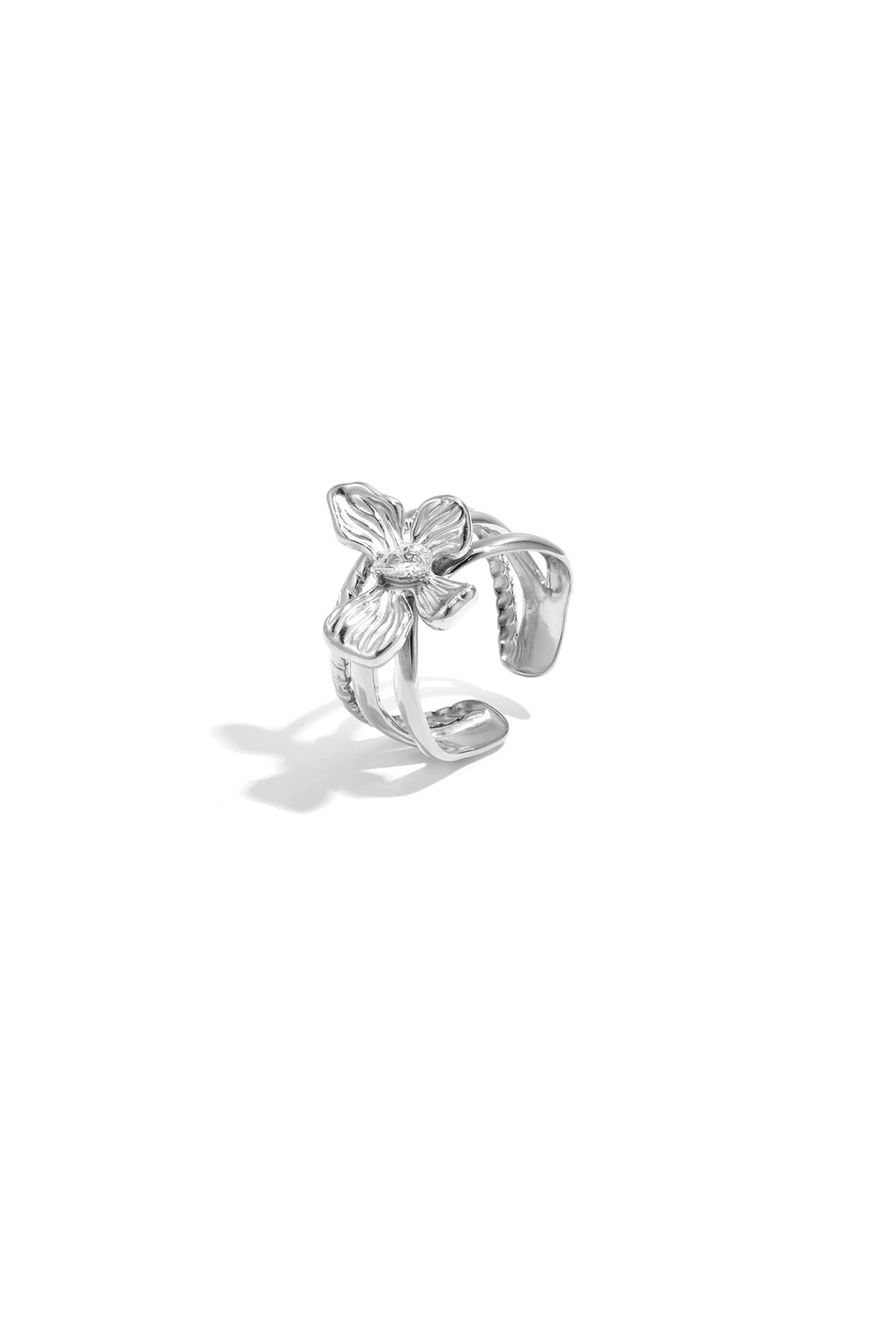 Bague imposante à plusieurs niveaux ornée de fleurs et de pierres