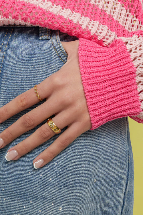 Bague ornée de pierres en forme de trèfle
