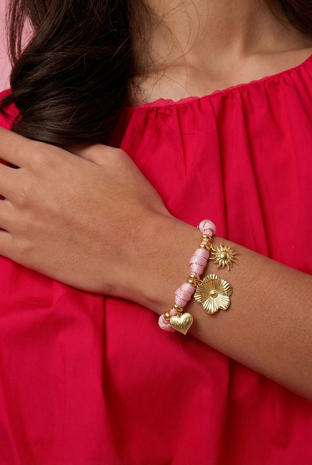 Rope bracelet with knots and various charms